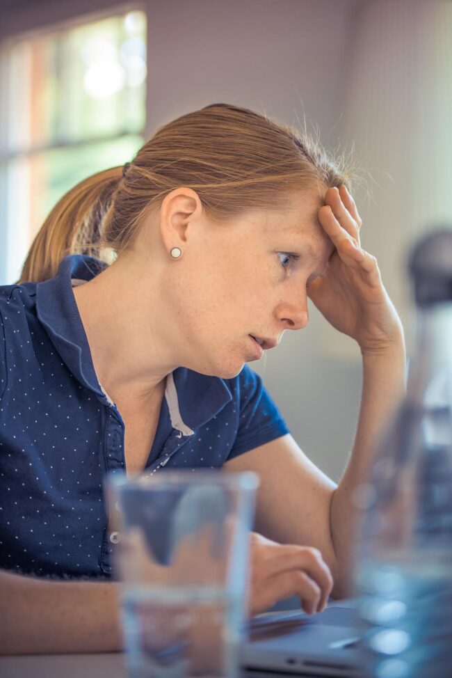 woman at computer frustrated